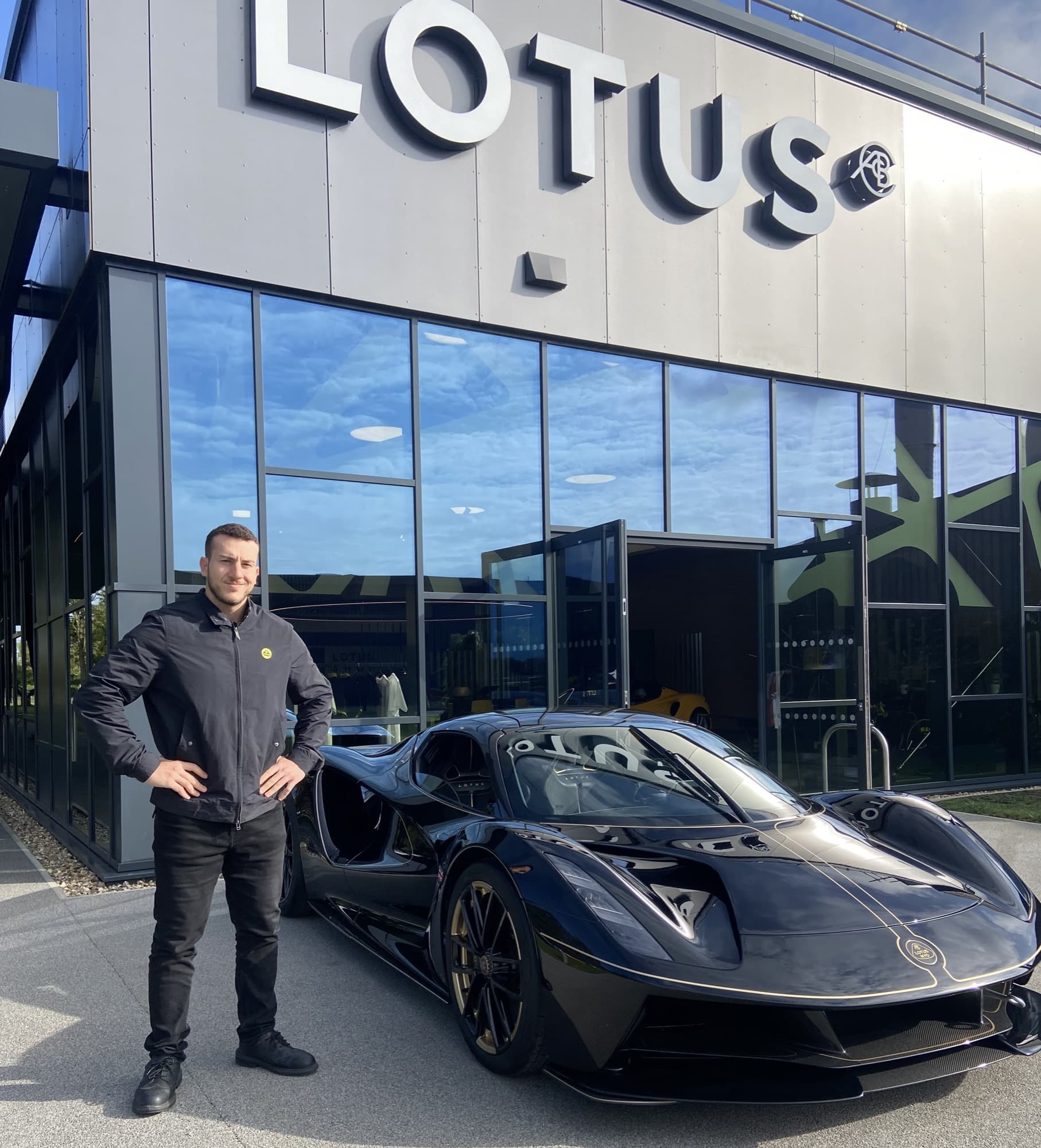 Daniel Michaelides with a Lotus Evija outside Lotus Cars